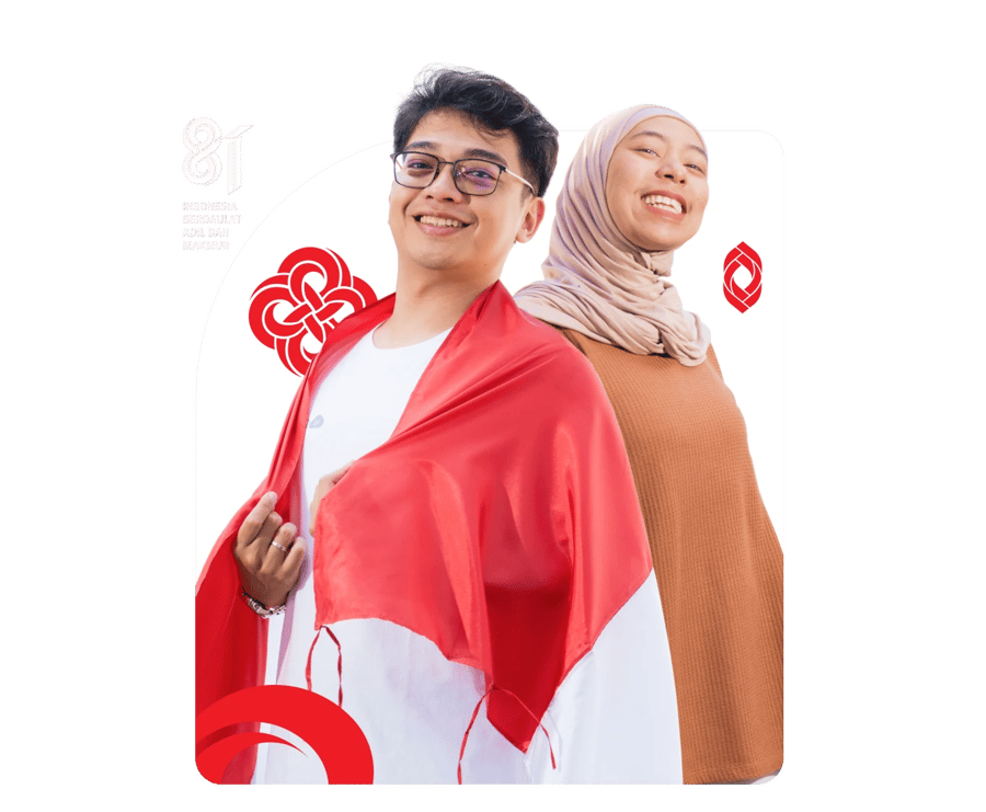 Dua orang Indonesia membawa bendera Merah Putih merayakan HUT ke-81 Kemerdekaan RI bersama IDCloudHost